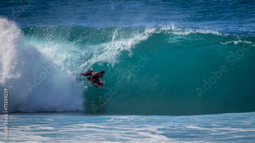 Bodyboarder in the tube