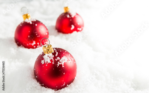 Red christmas balls with snow