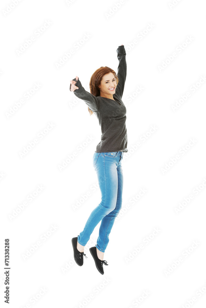 Young casual woman, student jumping. Young casual woman, student jumping.