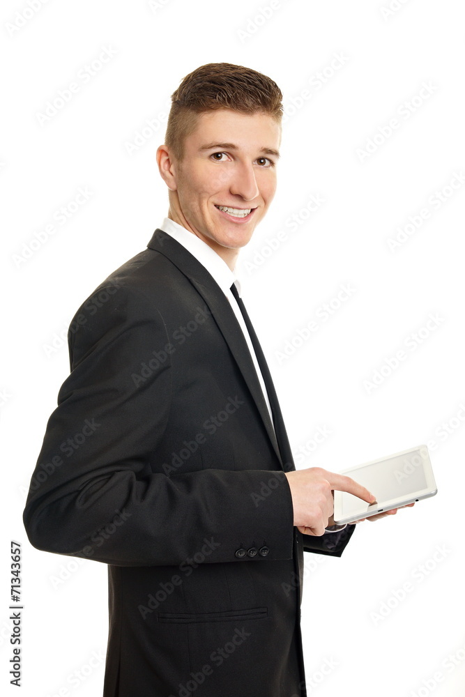 Young businessman writes on the tablet pc Young businessman writes on the tablet pc