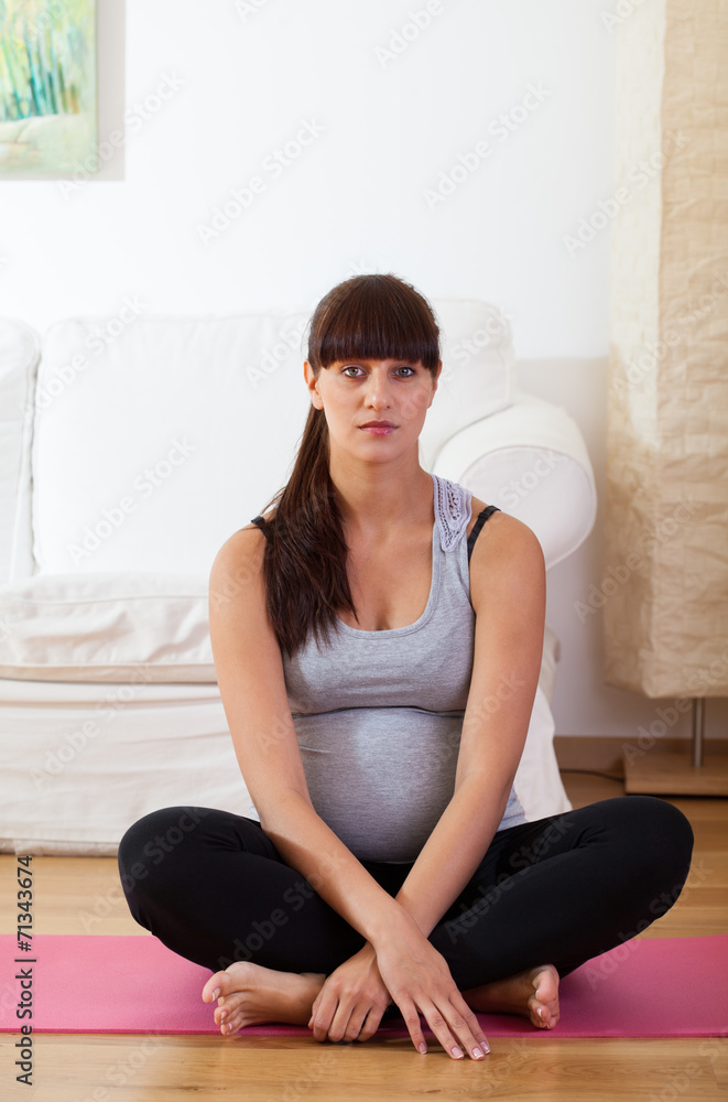 Pregnant woman before yoga