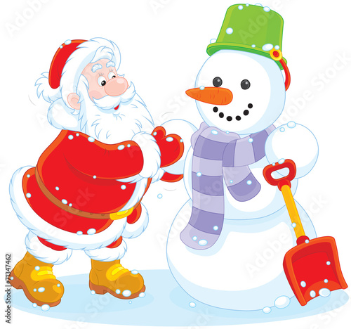 Santa making a snowman