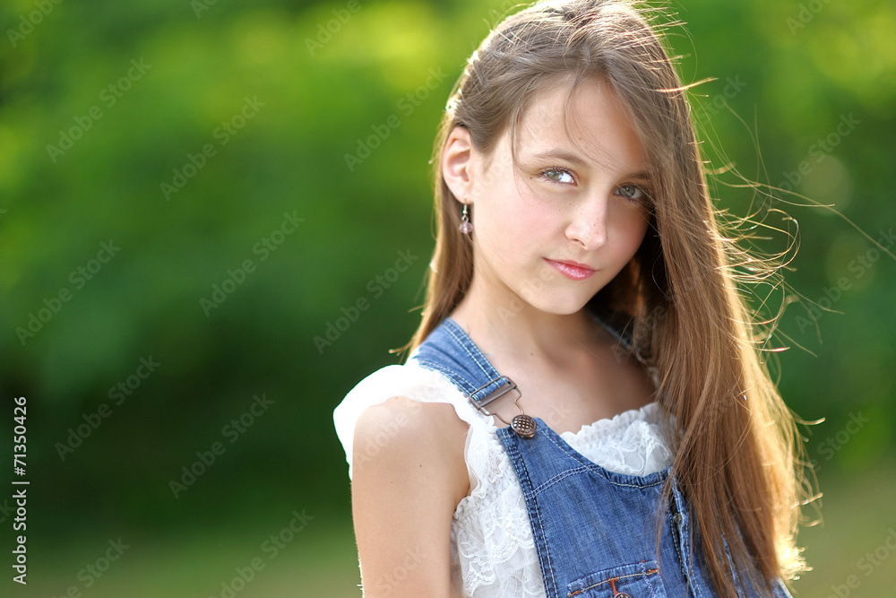 portrait of little girl outdoors in summer portrait of little girl outdoors in summer