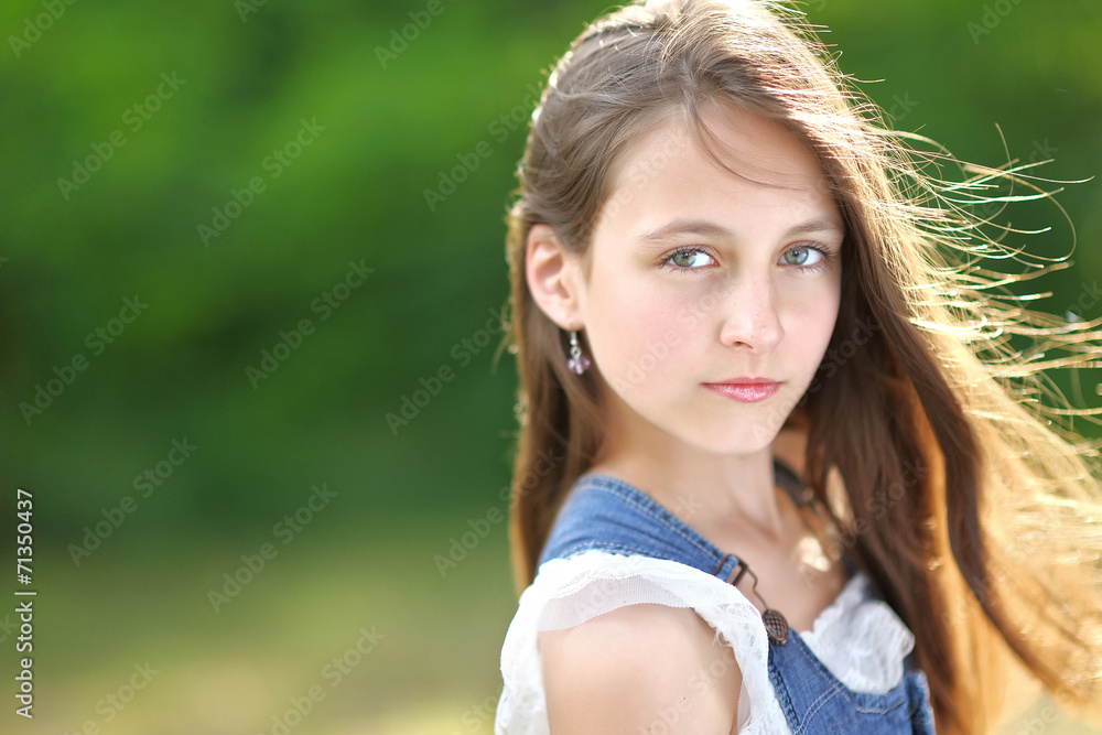 portrait of little girl outdoors in summer portrait of little girl outdoors in summer