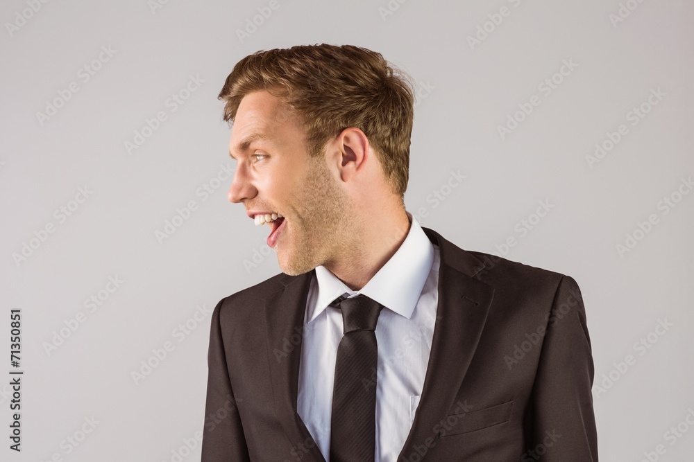 Young handsome businessman looking away Young handsome businessman looking away