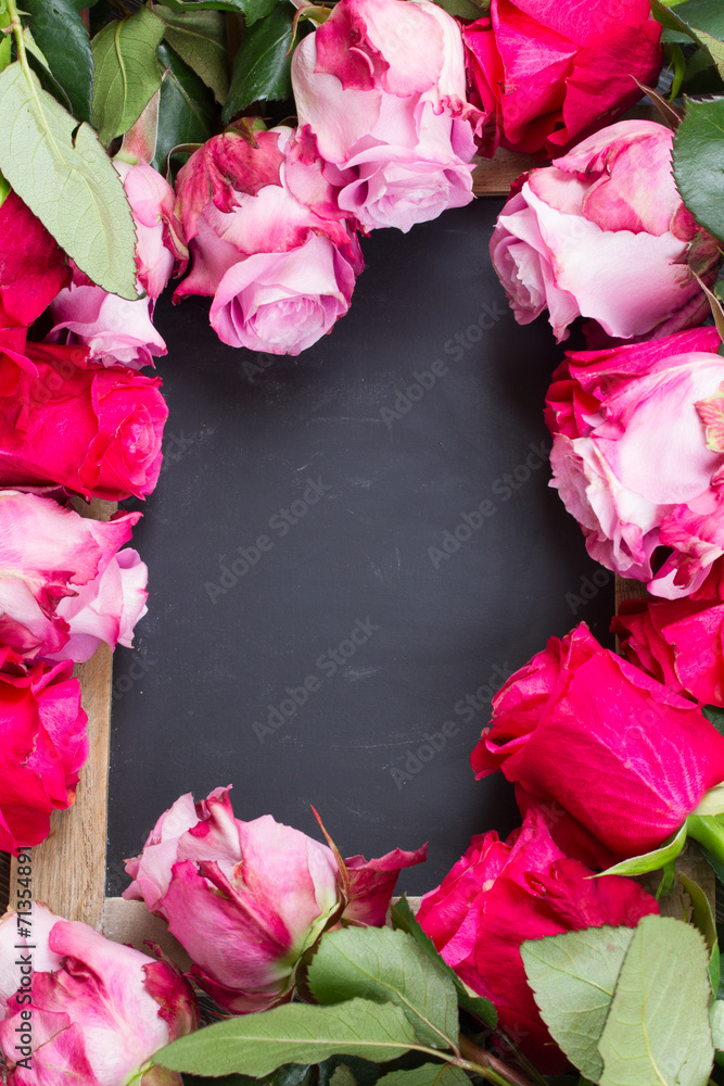red and pink  roses  frame on table - obrazy, fototapety, plakaty 