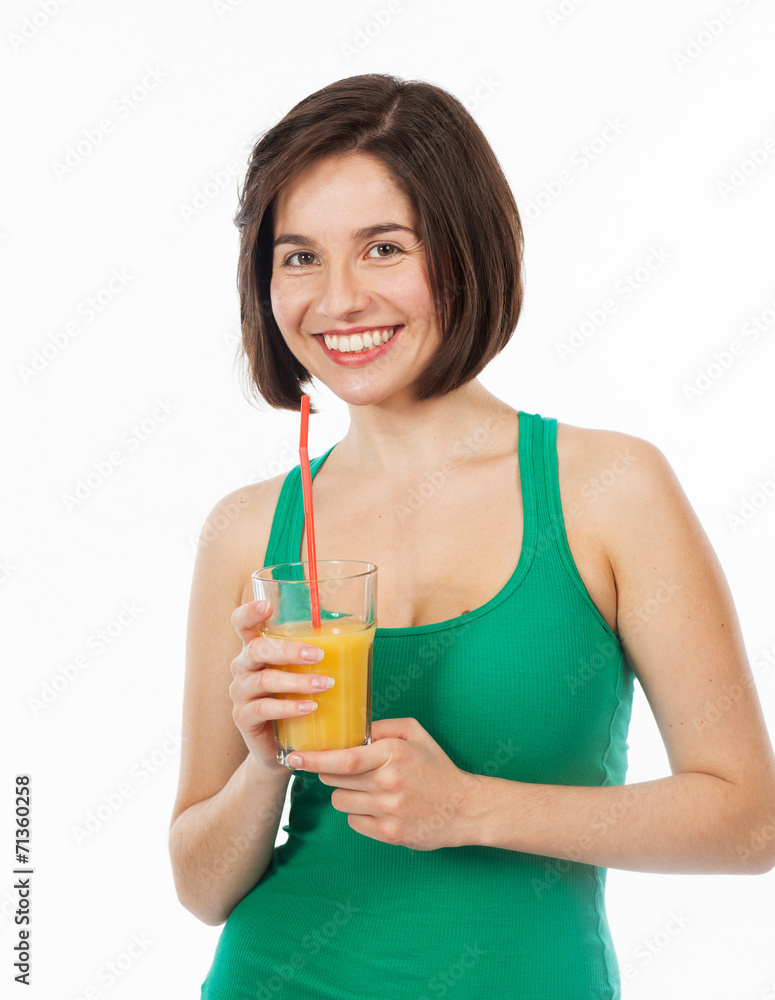 Beautiful brunette drinking an orange juice Beautiful brunette drinking an orange juice