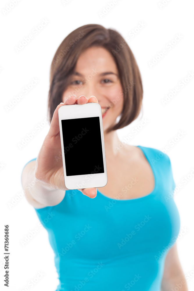 Brunette presenting a smartphone (focus on the phone)