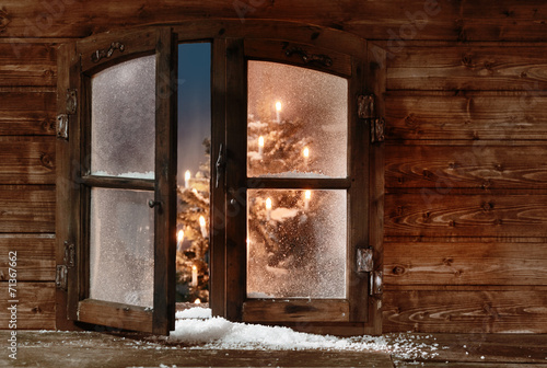 Snow at Open Wooden Christmas Window Pane photo