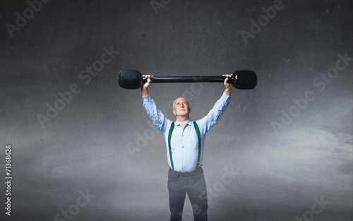 Foto old man in a peter pan fit syndrome