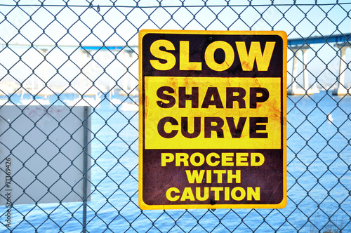 Warning signboard on the net fence. San Diego. USA.