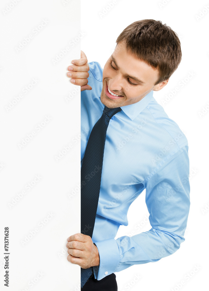 Businessman showing signboard, on white Businessman showing signboard, on white