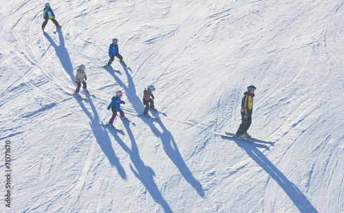 Instructor with a group of children. Austria