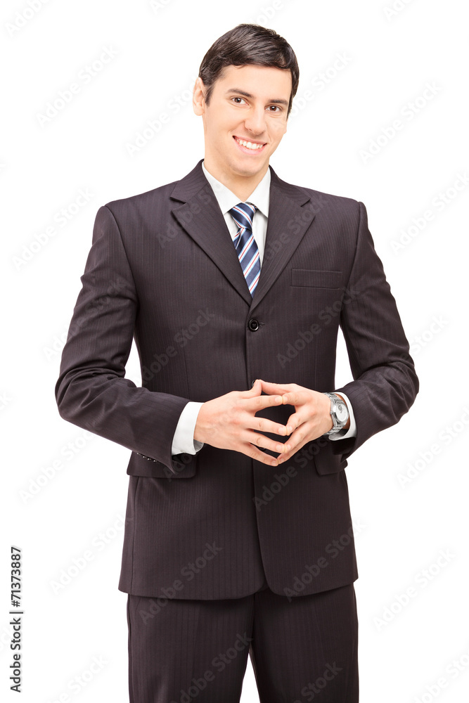 Vertical shot of a confident young businessman Vertical shot of a confident young businessman