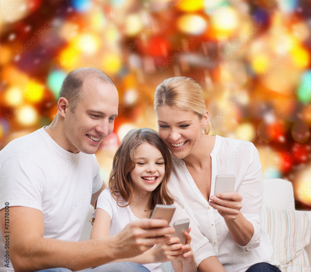 happy family with smartphones happy family with smartphones