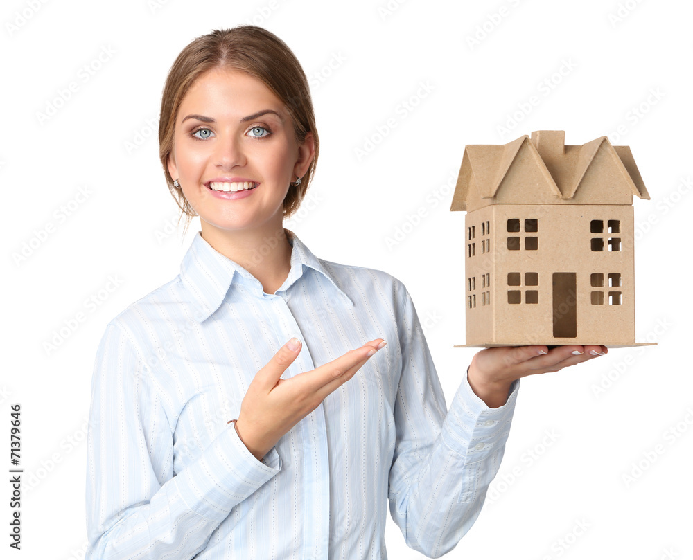 Portrait of female architect holding a little house, standing Portrait of female architect holding a little house, standing