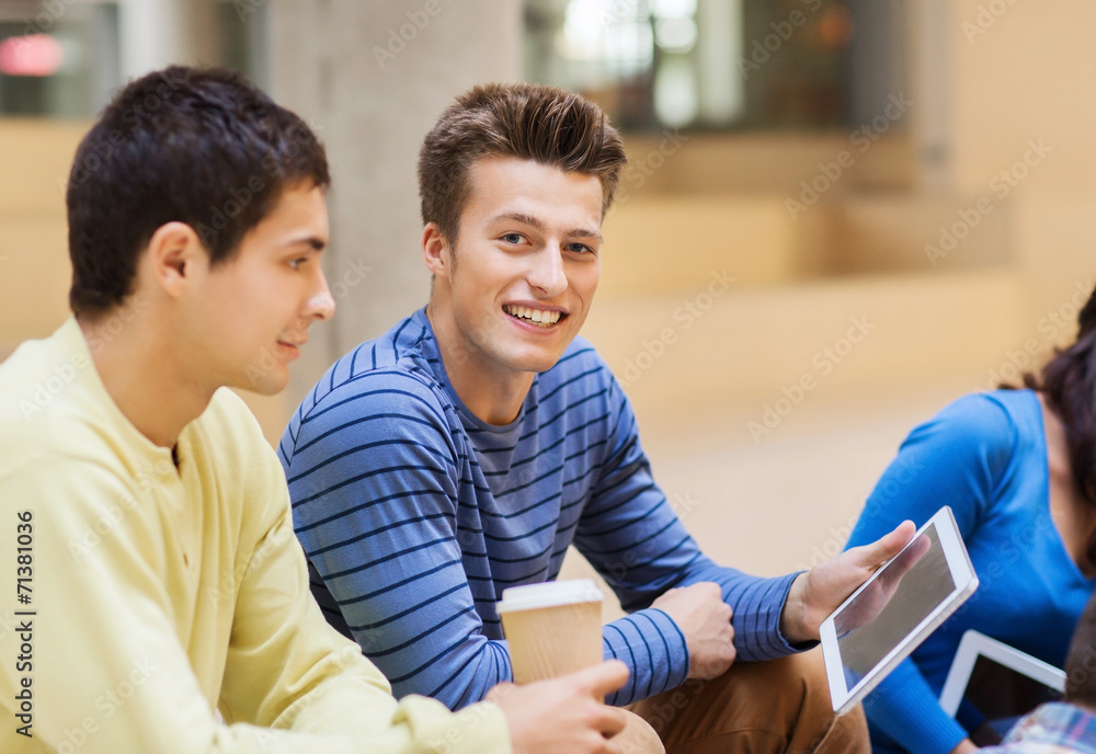 group of students with tablet pc and coffee cup