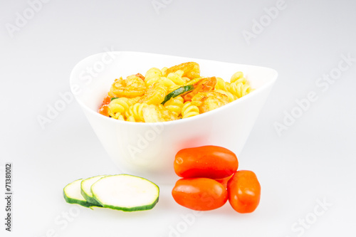 fusilli with curry, shrimps, zucchini and cherry tomato