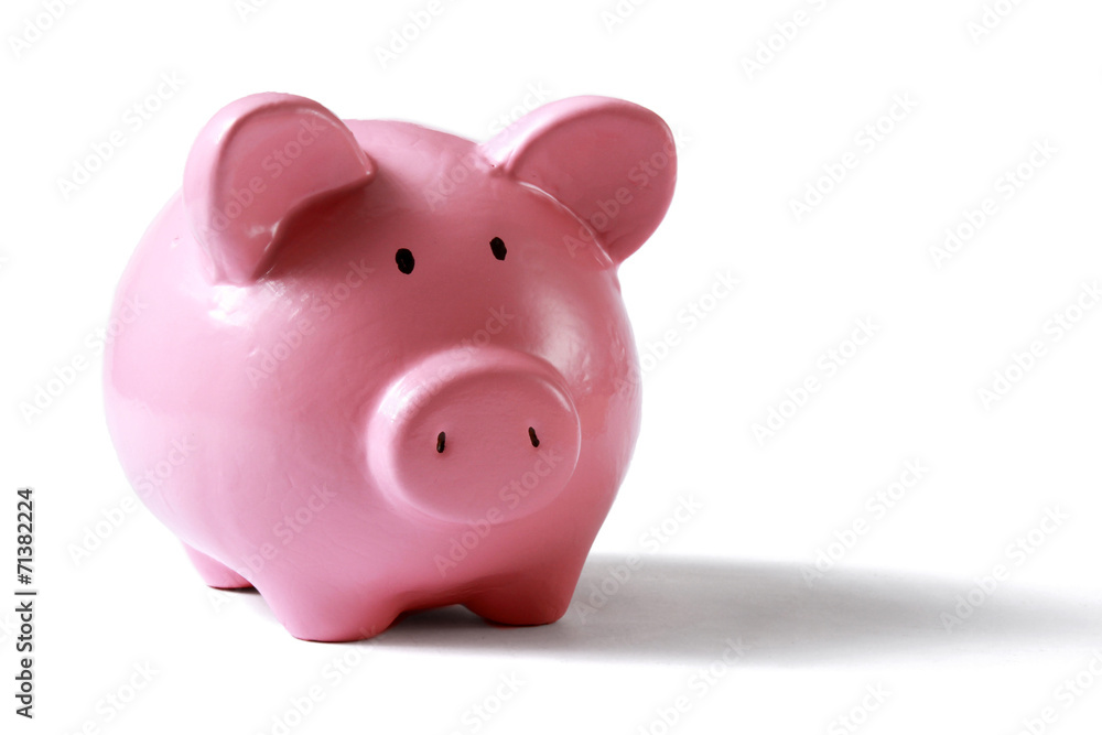 piggy bank with glasses in isolated white background