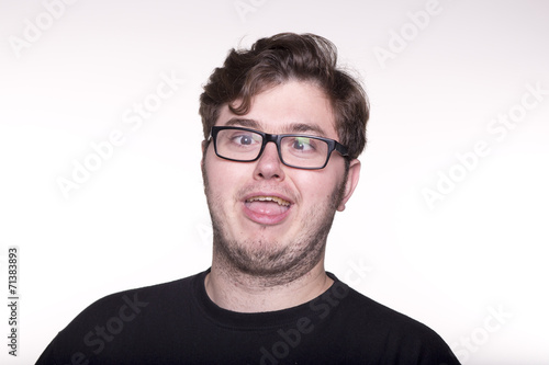 Canvastavla Joven con gafas haciendo mueca