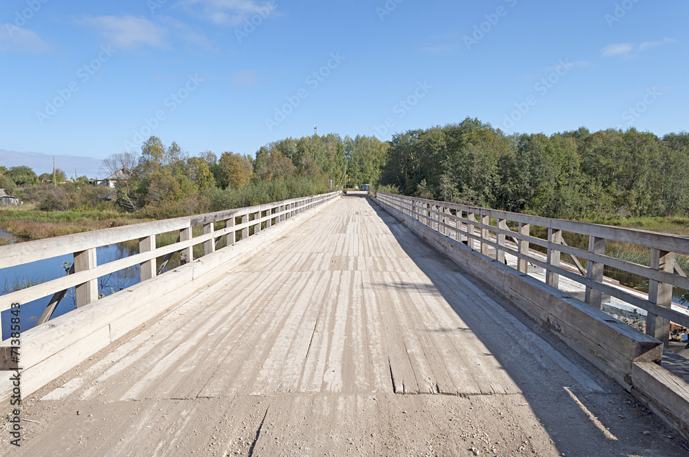 Old wooden bridge in the rural countryside