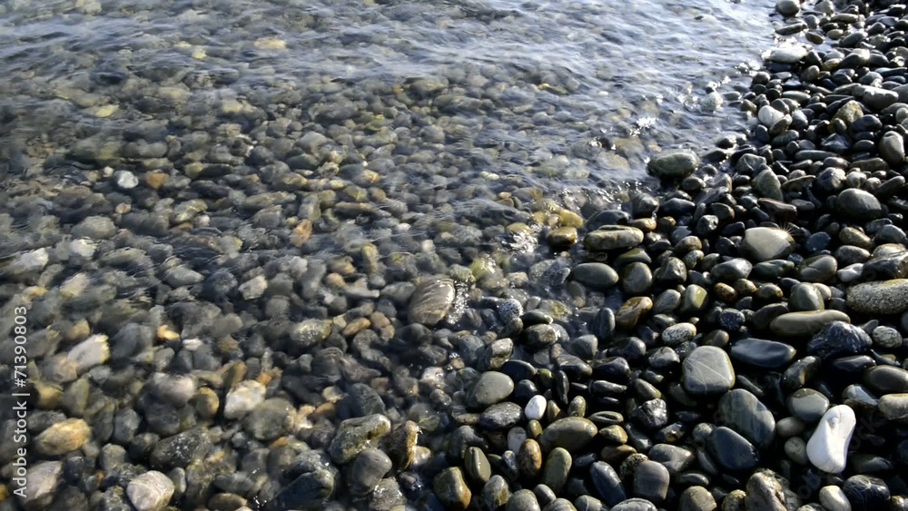 sea wave rolls on the shore of pebbles sea wave rolls on the shore of pebbles