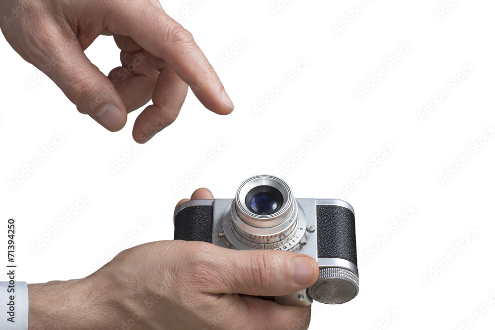 Fototapeta premium Vintage camera in man's hands