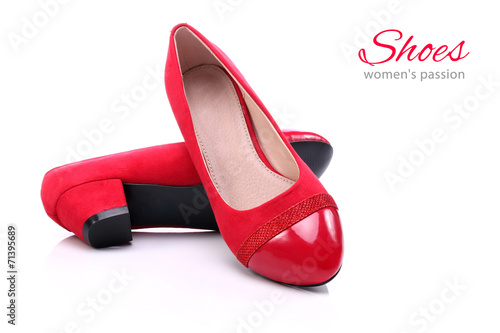 Womens red shoes on a white background © bluebat
