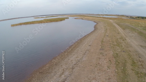 Wallpaper Mural Aerial view. Flying over a large lake, evening, sunset  Torontodigital.ca