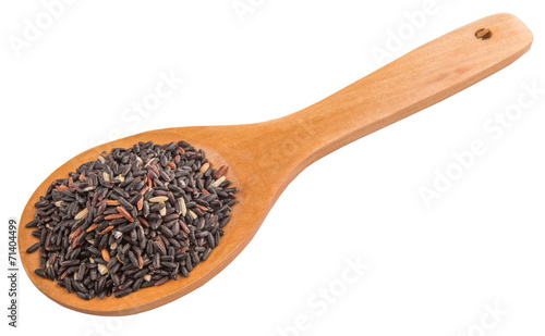 Black glutinous rice on a wooden spoon over white background
