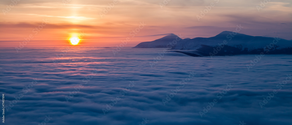 Mountain above the clouds