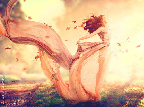 Autumn fantasy girl, fairy in blowing chiffon dress