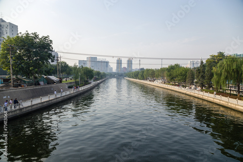 China, Beijing. City landscape with the river and the waterfront