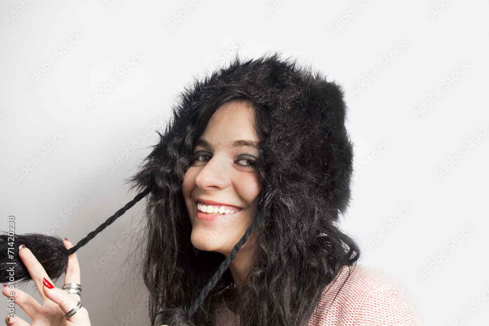 Obraz premium Fashion Girl with fur hat