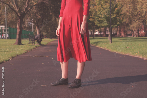 Young woman walking in the park
