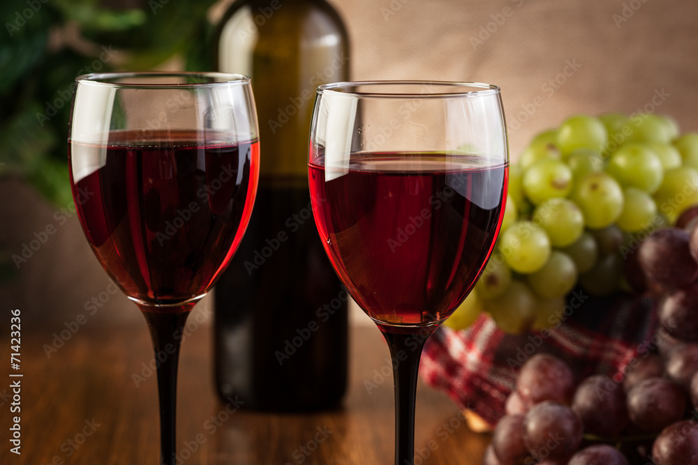 Glasses of red wine and bottle Glasses of red wine and bottle