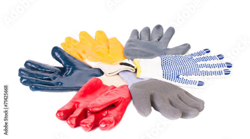 Various rubber worker gloves. photo