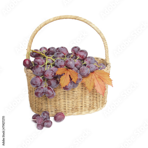 Grapes in a basket on a white background