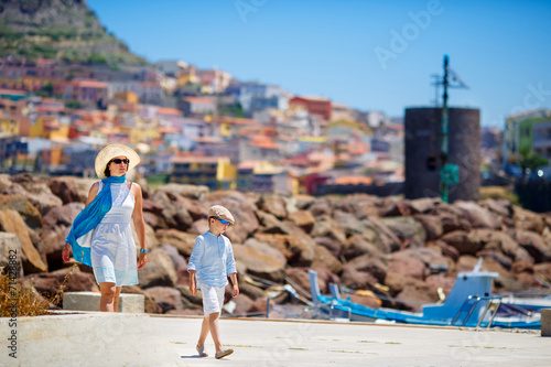 Mother and her little son outdoors in city