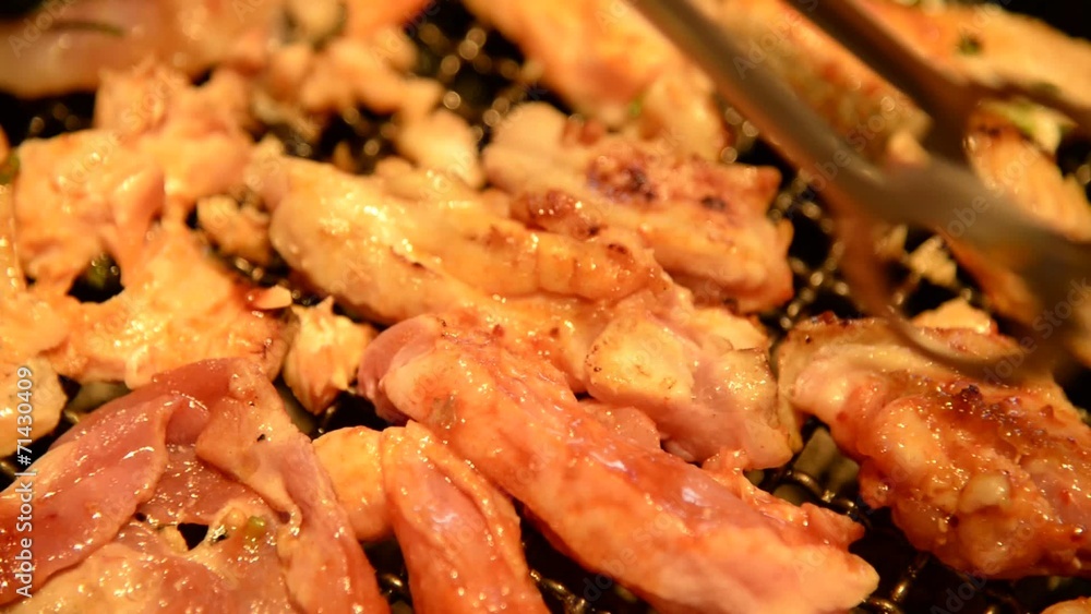 Korean Grilled meat closeup on hot stove Korean Grilled meat closeup on hot stove