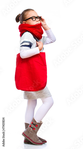 Cute girl with shopping bags