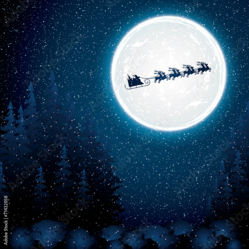 Santa Claus rides in a reindeer sleigh