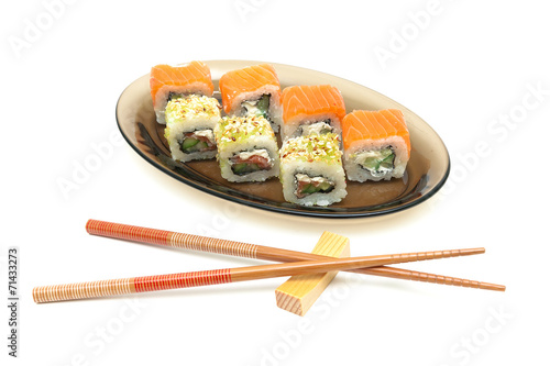 Japanese cuisine - rolls and chopsticks. white background.