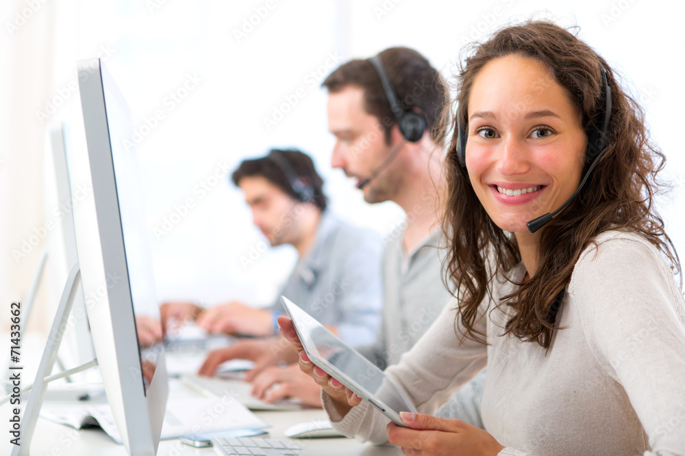 Young attractive woman working in a call center Young attractive woman working in a call center