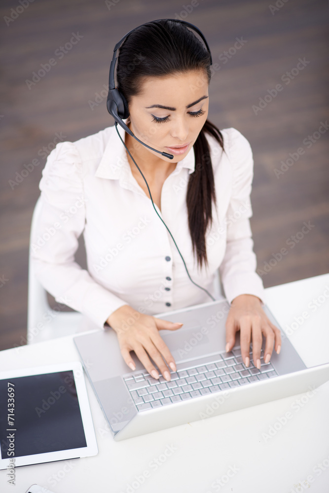 Virtual Customer Service Using Laptop on Table Virtual Customer Service Using Laptop on Table