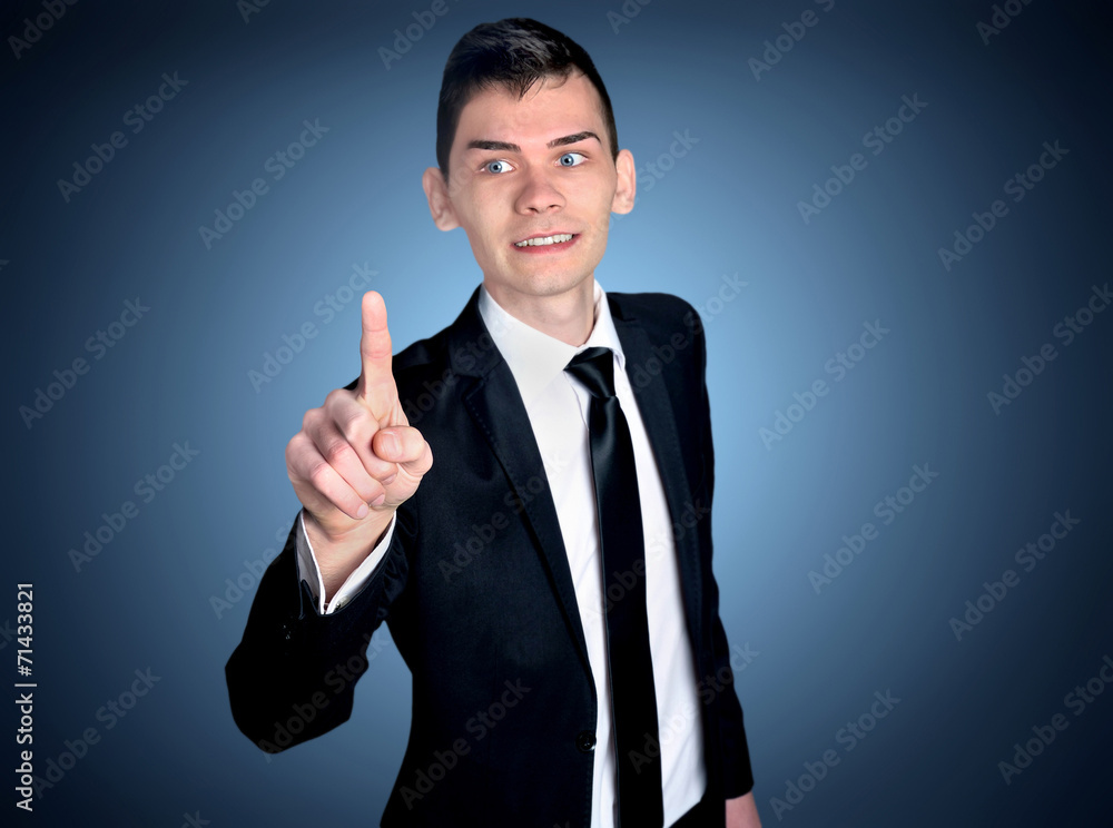 Business man pressing imaginary button Business man pressing imaginary button
