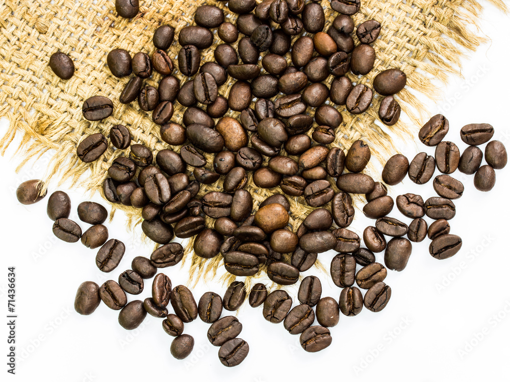 Fototapeta premium coffee beans on sack, white background