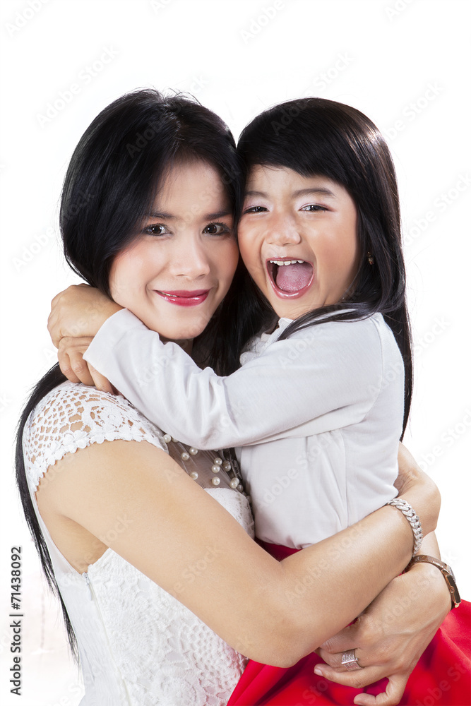Portrait of cheerful mother and daughter Portrait of cheerful mother and daughter