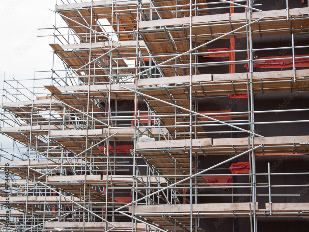 Scaffolded building in a UK construction project