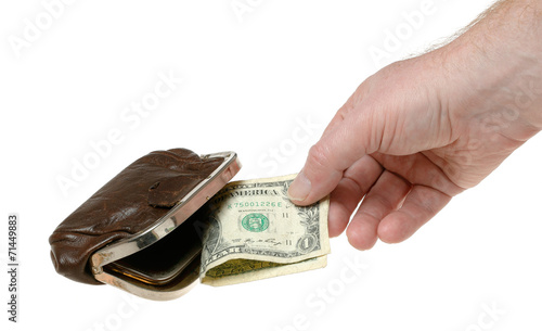 Purse with hand holding dollar